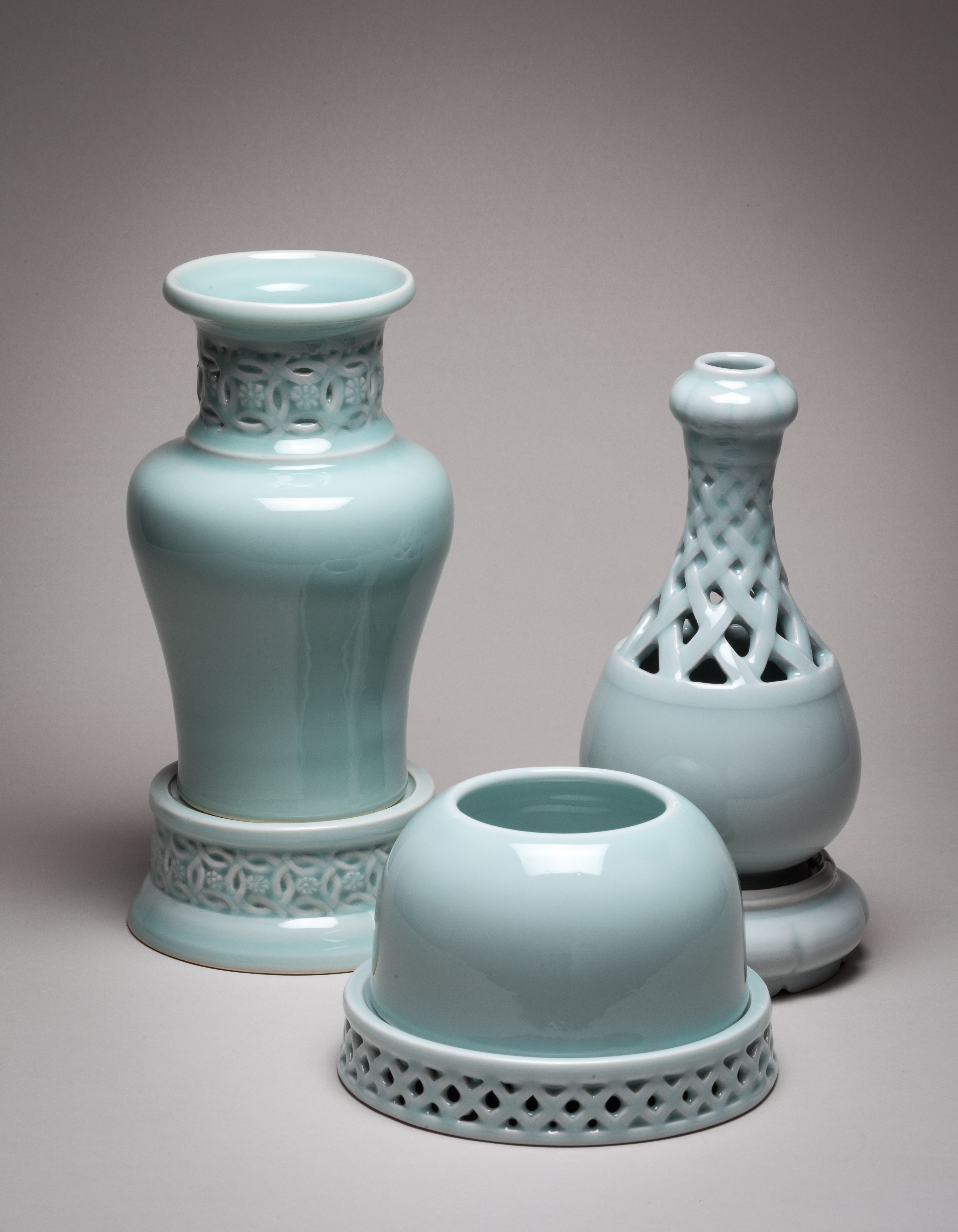 Carved and Pierced Celedon Vessels
